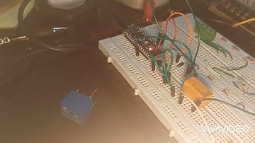 Circuito con rele en proteus y Arduino