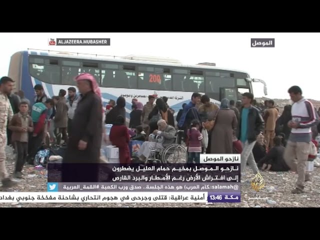 نازحو الموصل بمخيم حمام العليل يضطرون إلى افتراش الأرض رغم الأمطار والبرد
