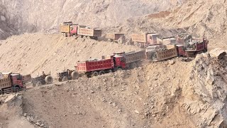 Raw Power in Action 💪Watch the Caterpillar 966F loading massive rocks with precision and strength