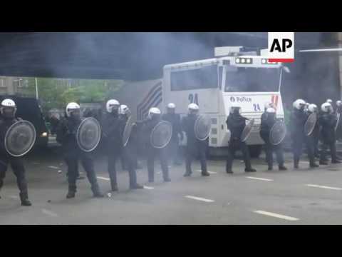 Belgian police and protesters clash