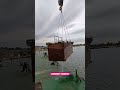 Loading the dredge’s final pontoon onto the deck with the American Crawler Crane.