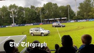 video: Football match abandoned after hearse drives onto pitch