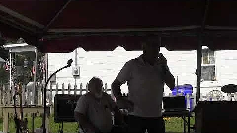 Brother Robert Corley preaching block party