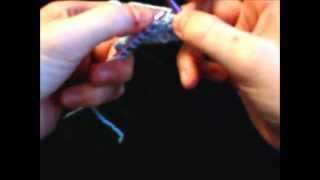 Bind off by knitting two together.