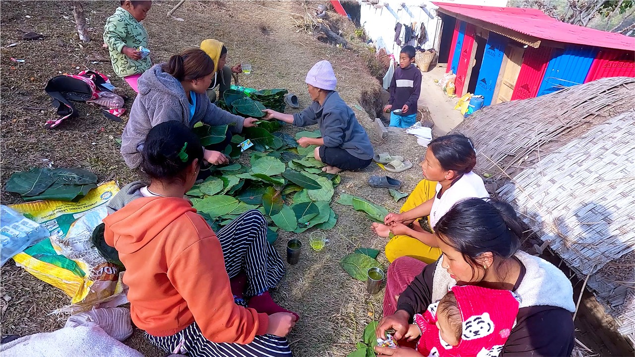 manjita weaving leaves plates with family & friends for village party