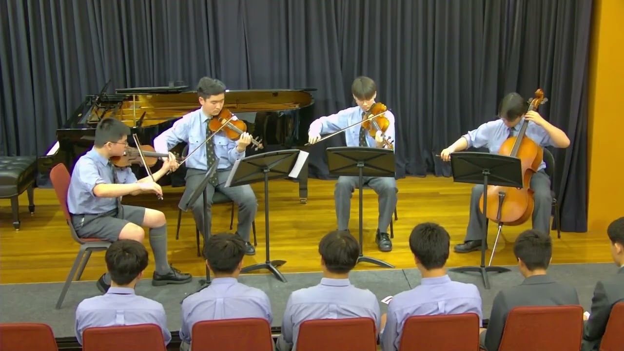 String quartet is performing at the stage