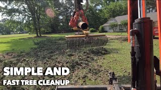 The giant rake raking heavy pine straw and cones