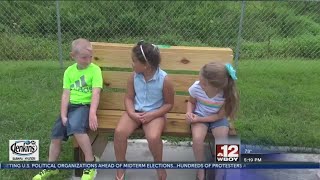 Community partners help create a student's Buddy Bench in Doddridge County