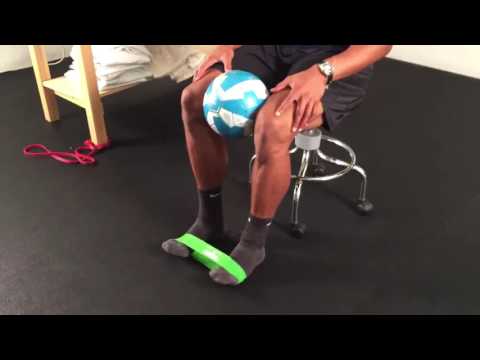Seated Ankle Eversion with Mini Band and Ball Between Knees