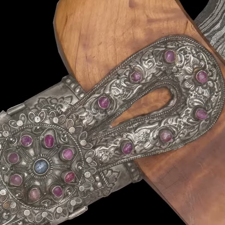 Keris with the silver inscribed hilt