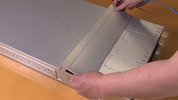 Lenovo ThinkSystem DA240 enclosure installing an enclosure cover