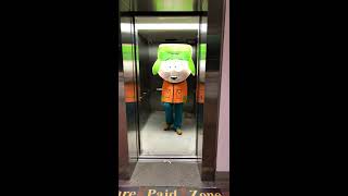 Guy walks out of elevator dressed in Kyle from South Park costume and kid in stroller gets scared
