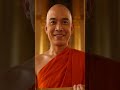 "A cinematic 10-second video of a middle-aged Buddhist monk (Thai style) with a kind and smiling fac