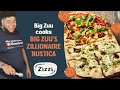 To celebrate the launch of the Zizzi Zillionaires’ Club, we invited double Bafta award-winning Big Zuu, host of Big Zuu Big Eats, down to the Zizzi kitchen to cook up his unique and exclusive pizza, Big Zuu’s Zillionaire Rustica.

It’s a pizza of two halves – one; spring onions, mozzarella, balsamic onions and goat’s cheese on a white base.  The other, spinach, flame roasted peppers, roquito peppers, harissa, spring onions, rocket and mozzarella on a tomato base. A pizza fit for a Zillionaire!

Enjoy this Special Guest pizza, live on the menu nationwide from 1st November, and available for a limited time only.

Join the Zillionaires’ Club here: https://bit.ly/3h1B2BK
Find out more: https://bit.ly/3TTI9dM

See the full recipe here: https://bit.ly/3FD1AmU

Visit the website: https://bit.ly/3t0KqIw
Follow us on Instagram: https://bit.ly/3hc4Vzm

Credits:
@itsbigzuu 
Soul Club Media