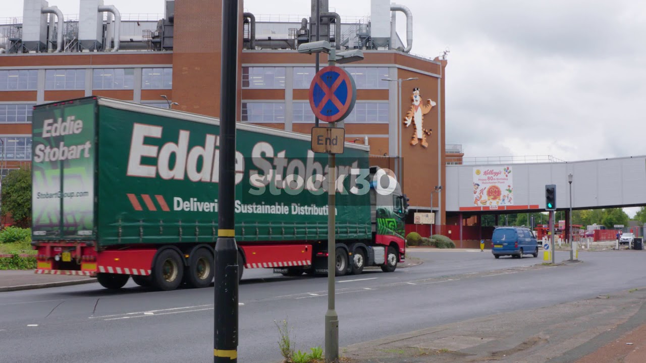 Vehicles Passing By The Kelloggs Factory In Trafford Park, UK YouTube