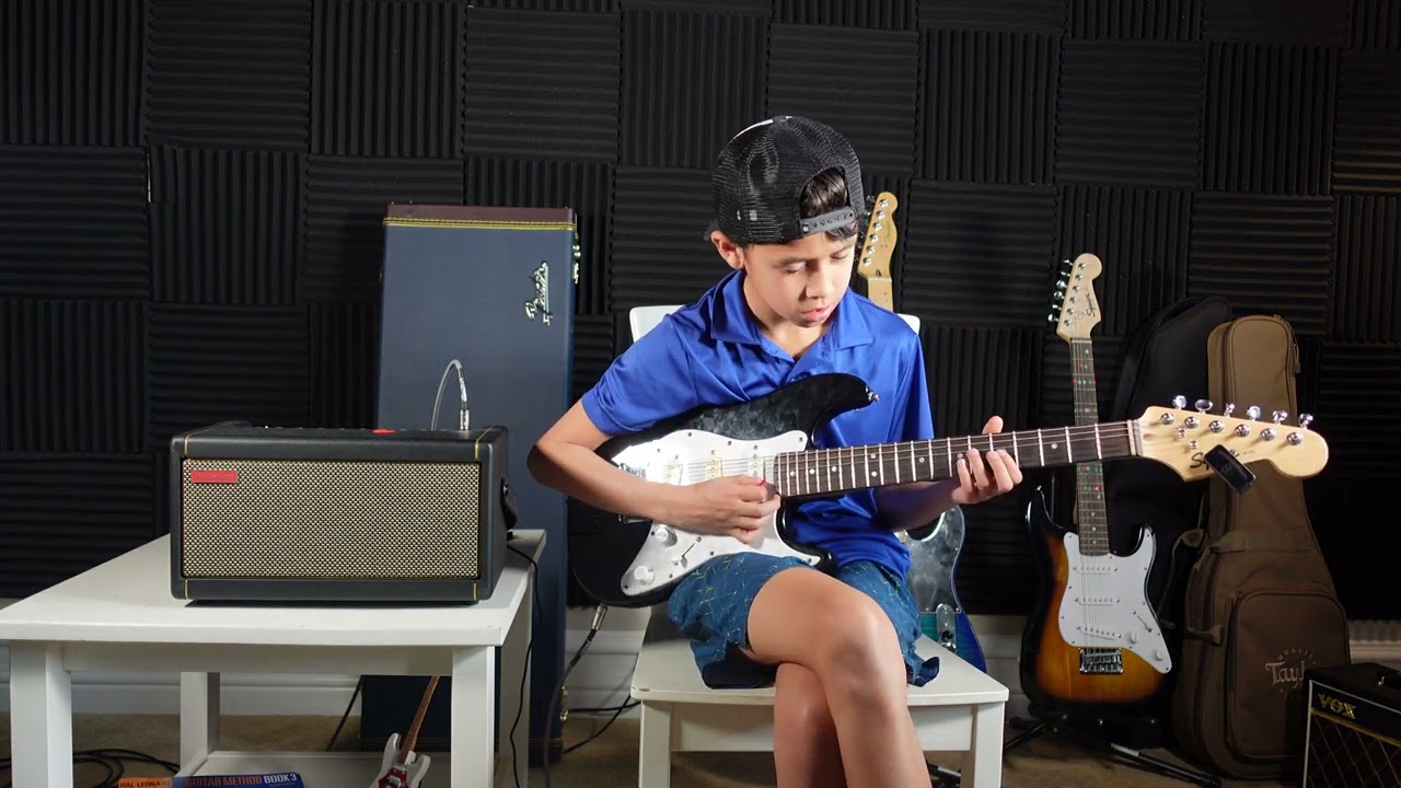 10 year old playing effortlessly across the fretboard (Jazz guitar improvisation / Key: A Minor)