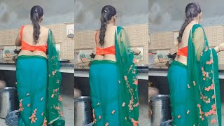 Green Net Saree With Orange Backless Blouse Traditional Kitchen Vibes Back Pose Saree Indoor