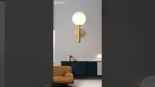 Brass globe wall lamp:frosted orb + sleek arm,quiet luxury for mirrors/bedside.#walllights