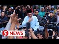 Anwar performs Friday prayers at Kg Sungai Merab mosque