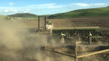 Pasture plowing, disking, and planting late early summer 2014 JD 4640 and 4230