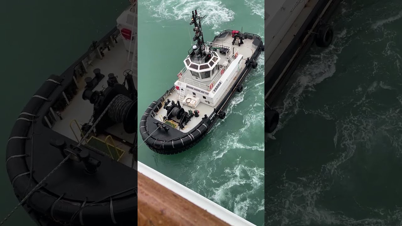 Broome  Australia tugboat Holds Zaandam steady in rough weather