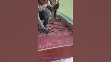 Concrete Rebar Anchoring: Workers Securing Reinforcement Bars