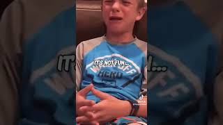 KID CRIES OVER TAXES