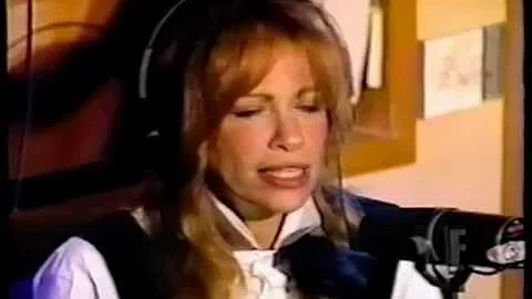 Carly Simon with Howard Stern in 1995