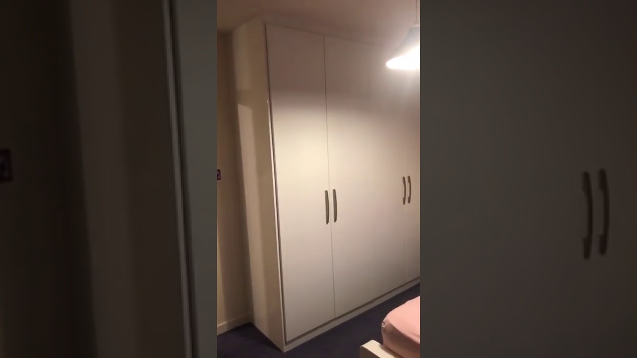 Simple Fitted Bedroom Wardrobe by Sunny Bedrooms and Kitchens Limited