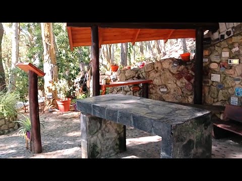 Our Lady of Lourdes Grotto in the forest. Vivero de Miramar, Buenos Aires province, Argentina.