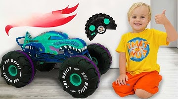 Vlad and Chris learn to share toys playing with Hot Wheels RC Monster Trucks