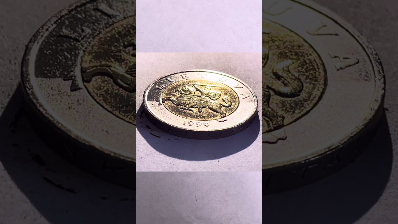 Removing a layer of dirt from a 1999 coin using Laser technology 