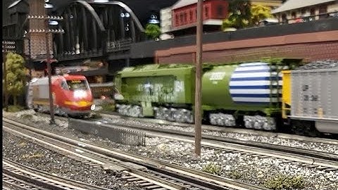 Lionel Legacy Army DOD Veranda #1941 meets Lionel Legacy Santa Fe Acela #100 - Corner Field Railroad