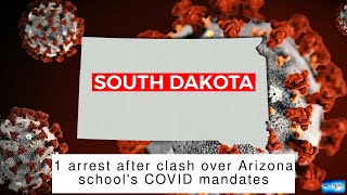 1 arrest after clash over Arizona school's COVID mandates