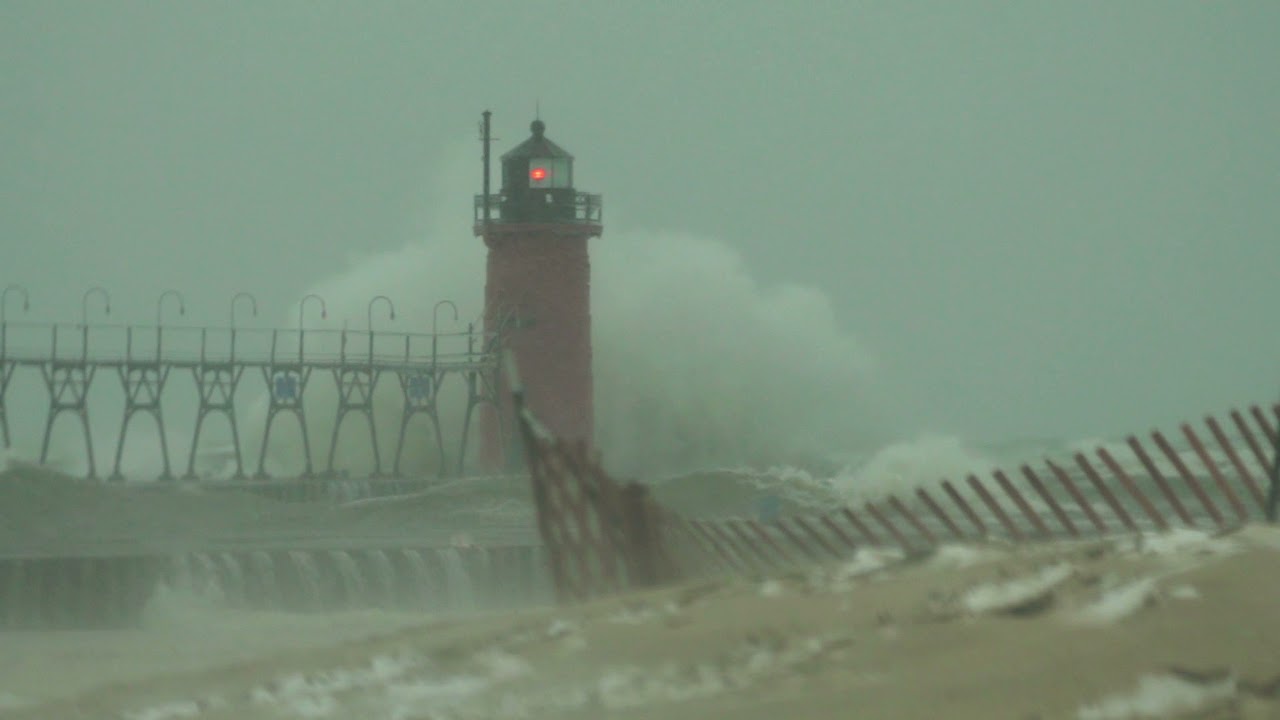 12 foot waves breaking on the icy pier - South Haven Lighthouse 1-5-22