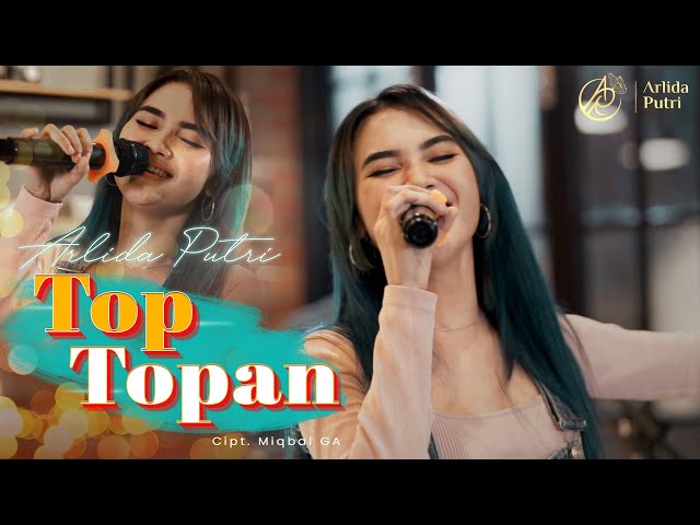 Arlida Putri  -  Top Topan (Official Music Video) class=