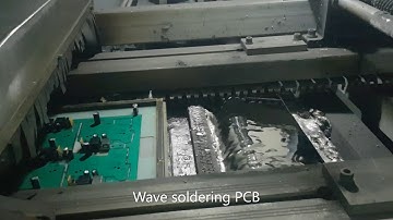 Wave Soldering Process for Electronics Manufacturing.  PCB Through-Hole Assembly