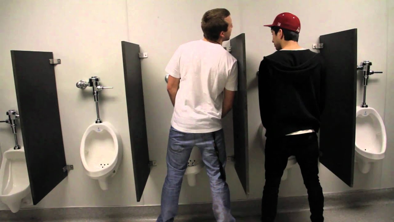 Gif guy using restroom dick falls out