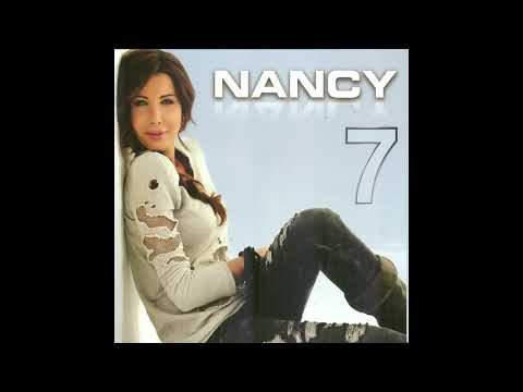 Nancy Ajram - Ma Tegi Hena - (Official Music Video) / نانسي عجرم - ما تيجي هنا