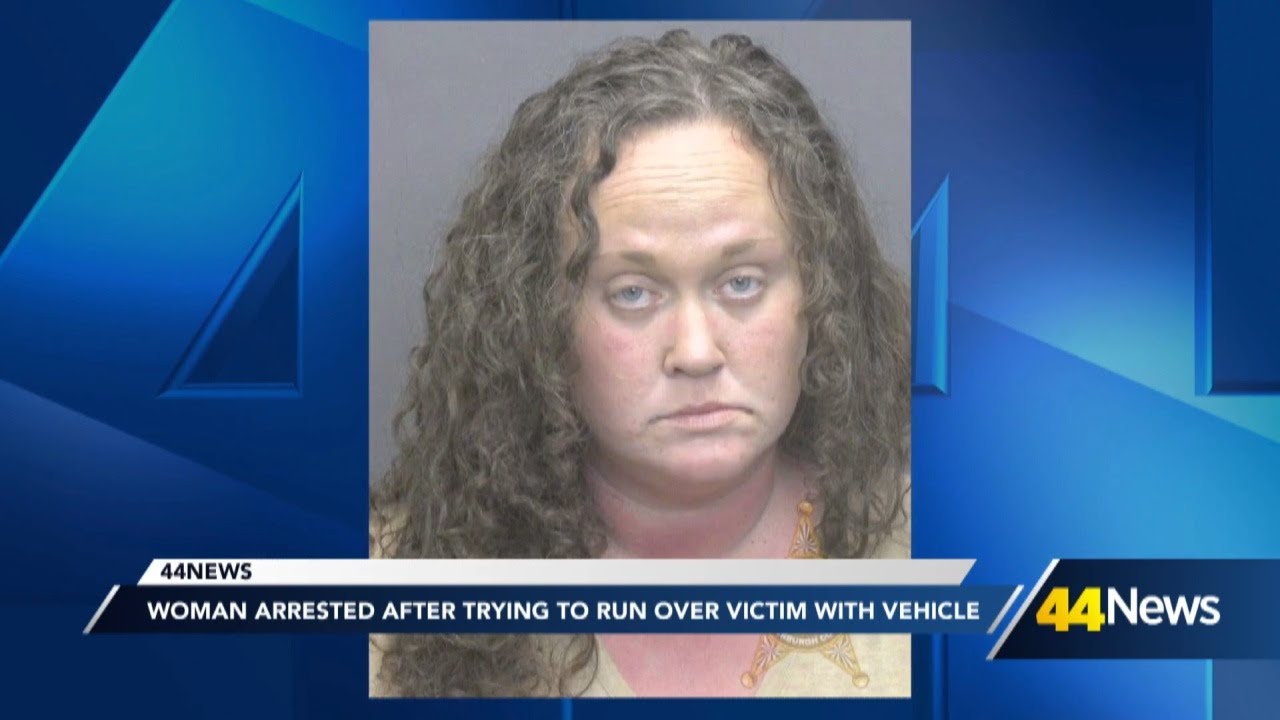 Woman accused of trying to hit victim with vehicle after shoplifting ...
