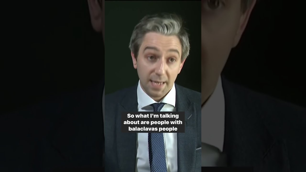 Simon Harris Reacts To Migrant Protesters Wearing Balaclavas Brandishing The Irish Tricolour