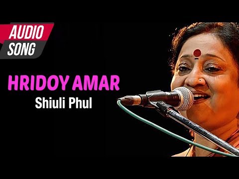 在 YouTube 上观看 Hridoy Amar - Indrani Sen | Rabindra Sangeet | Shiuli Phul | Tagore Song | Atlantis Music