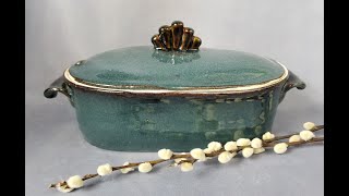 Making a Handmade ceramic covered oval baking dish on the pottery wheel with a slab bottom and lid.