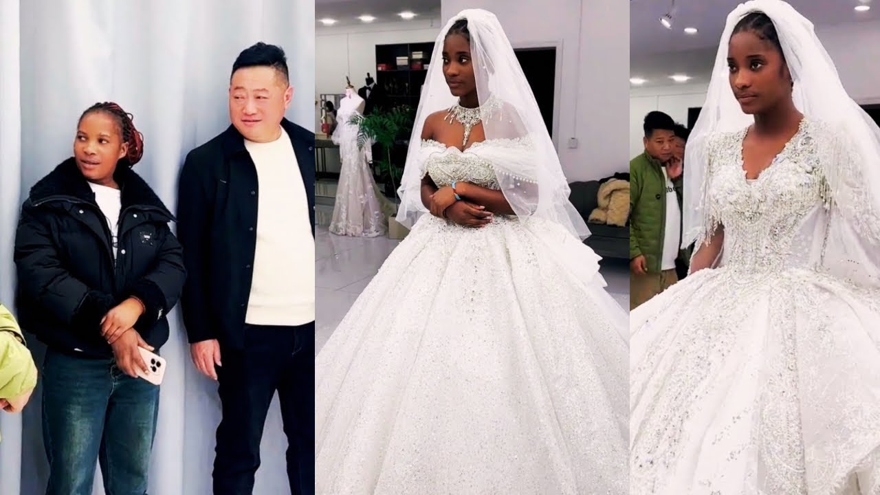 Angina tries on wedding dress