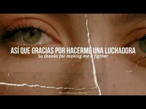 Watch the video for Fighter en español