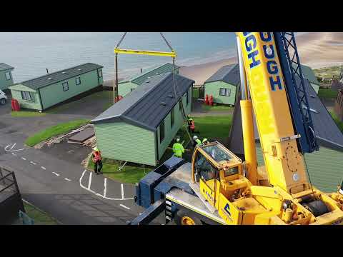 Pettycur Bay holiday home from transporter to pitch using a mobile crane