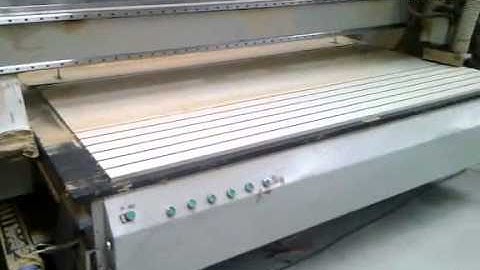 2 CNC machine for the production of slatwall panels