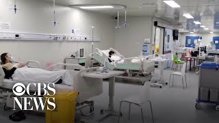 China raises Wuhan virus death toll 50%