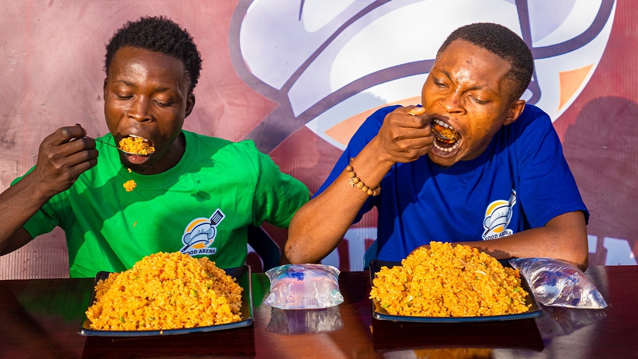THE FIRST PERSON TO FINISH THIS GIANT PLATE OF RICE WINS A PRIZE.
