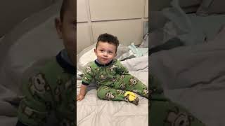 Guy throws American cheese at boy who's laying in bed